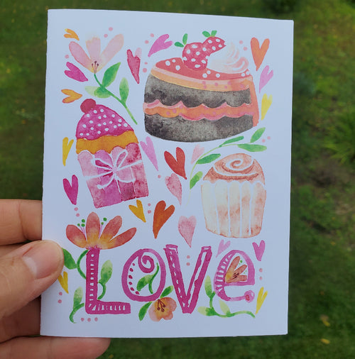 Cheerful pastries with the word Love  card